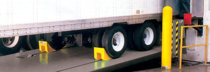 vehicle restraints on a truck at a loading dock