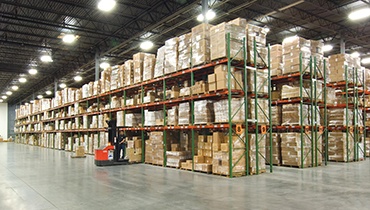 warehouse storage racks full of organized inventory