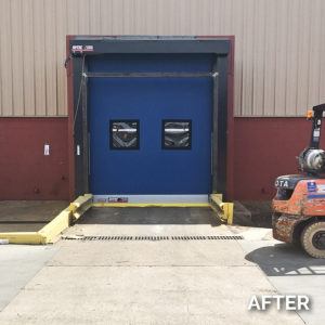 blue loading dock door installed by Dixie Warehouse Solutions - after photo