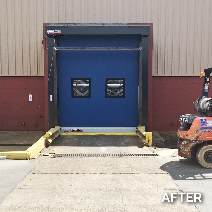blue loading dock door installed by Dixie Warehouse Solutions - after photo